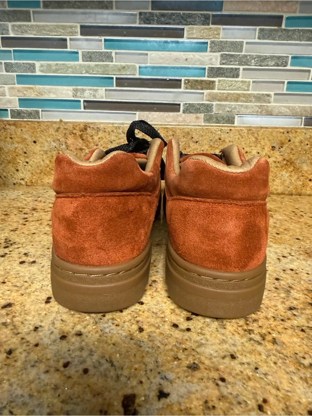 New Balance unisex Suede Sneaker in Rust Orange with Gum Sole